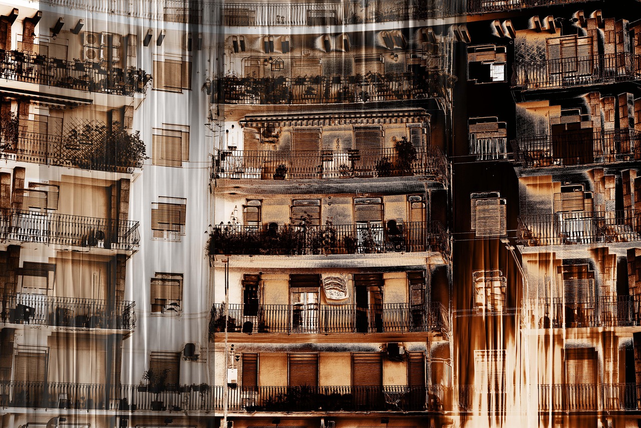 Fachada de edificio residencial moderno con balcones, ejemplo de arquitectura urbana actual