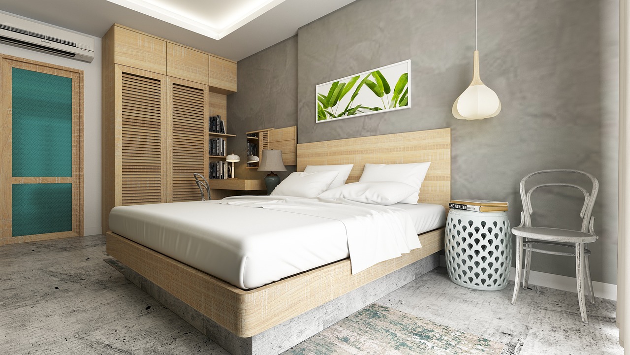 Habitación moderna con suelo de microcemento gris y acabado liso
